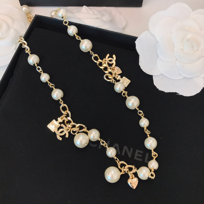 CHN78 Perfume bottle Pearl necklace,2 used necklace (can also be wound 2 times as a bracelet) Jewelry