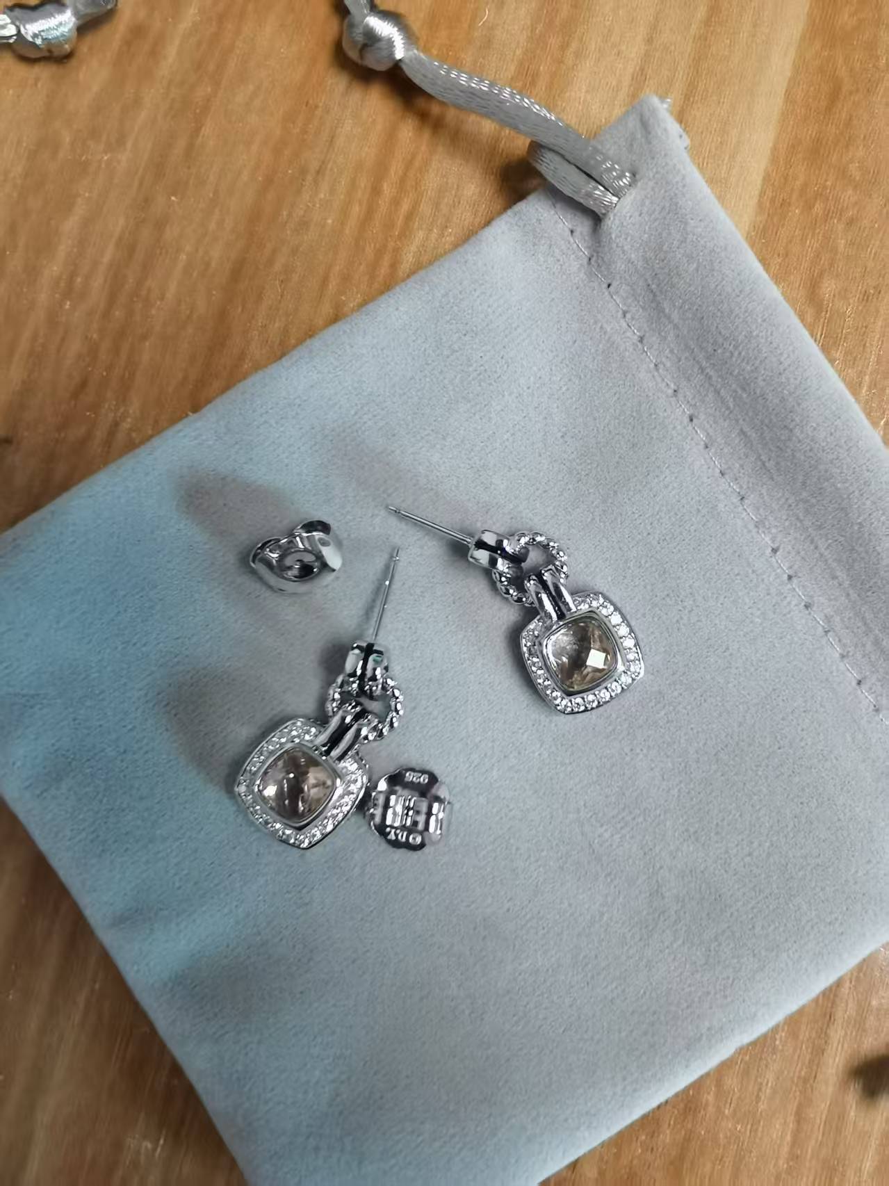 DY DE65 European and American Popular Versatile Zircon Link Twisted Double Button Earrings Jewelry