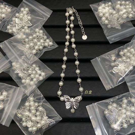 DIN3  Gilt hollow pearl butterfly necklace  Jewelry