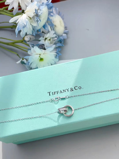 X642    Women's titanium steel buckle ring double ring necklace jewelry